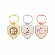The Shield Shaped Zinc Alloy Keyring comes in a variety of colors.